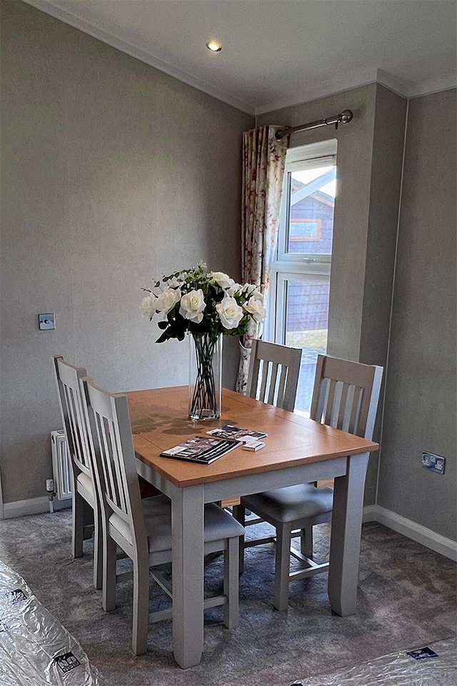 Dining room in the Stately Wentwood park home